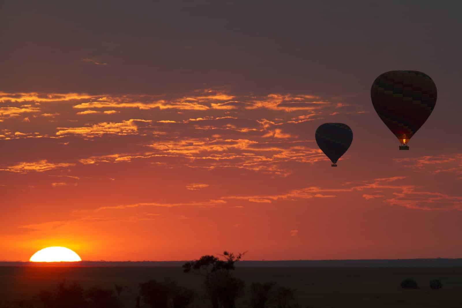 <p><span>A hot-air balloon safari in the Serengeti is an experience of a lifetime. Floating silently above the savannah at sunrise, you witness the park from a vantage point like no other. The balloon’s path, dictated by the morning breezes, offers a tranquil and panoramic view of the sprawling Serengeti below.</span></p> <p><span>From this aerial perspective, the scale and beauty of the park are truly appreciated, revealing patterns of movement and life that are invisible from the ground. The flight culminates in a traditional champagne breakfast in the bush, a fitting end to an unforgettable journey.</span></p> <p><b>Insider’s Tip: </b><span>Book well in advance as these popular safaris have limited capacity. </span></p> <p><b>When to Travel: </b><span>Year-round, with clearer skies during the dry season. </span></p> <p><b>How to Get There: </b><span>Most balloon safaris launch near the Seronera region, accessible from nearby lodges.</span></p>