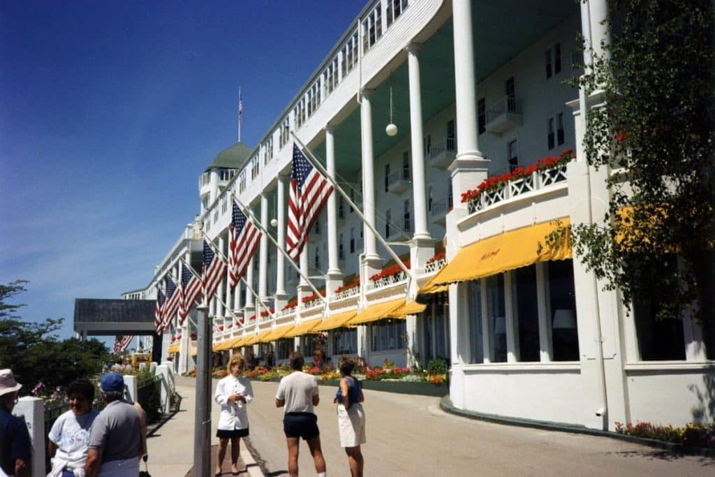 <p>Mackinac Island’s Grand Hotel, where “Somewhere in Time” starring Christopher Reeve and Jane Seymour was filmed, is a time capsule of elegance. Visitors can enjoy the hotel’s historic charm and picturesque setting, taking a step back in time just like the film’s protagonist.</p>