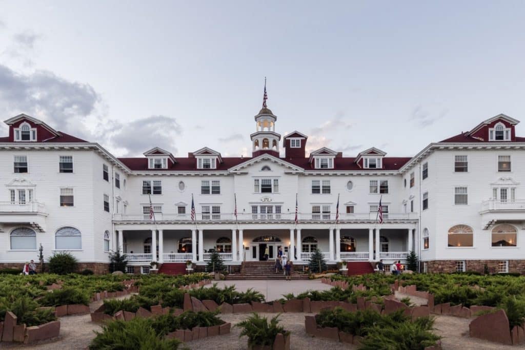 <p>While not a filming location, The Stanley Hotel in Colorado famously inspired Stephen King to write “The Shining.” Visitors can explore this historic hotel, which embraces its spooky reputation with ghost tours and a hedge maze reminiscent of the film’s eerie scenes.</p>