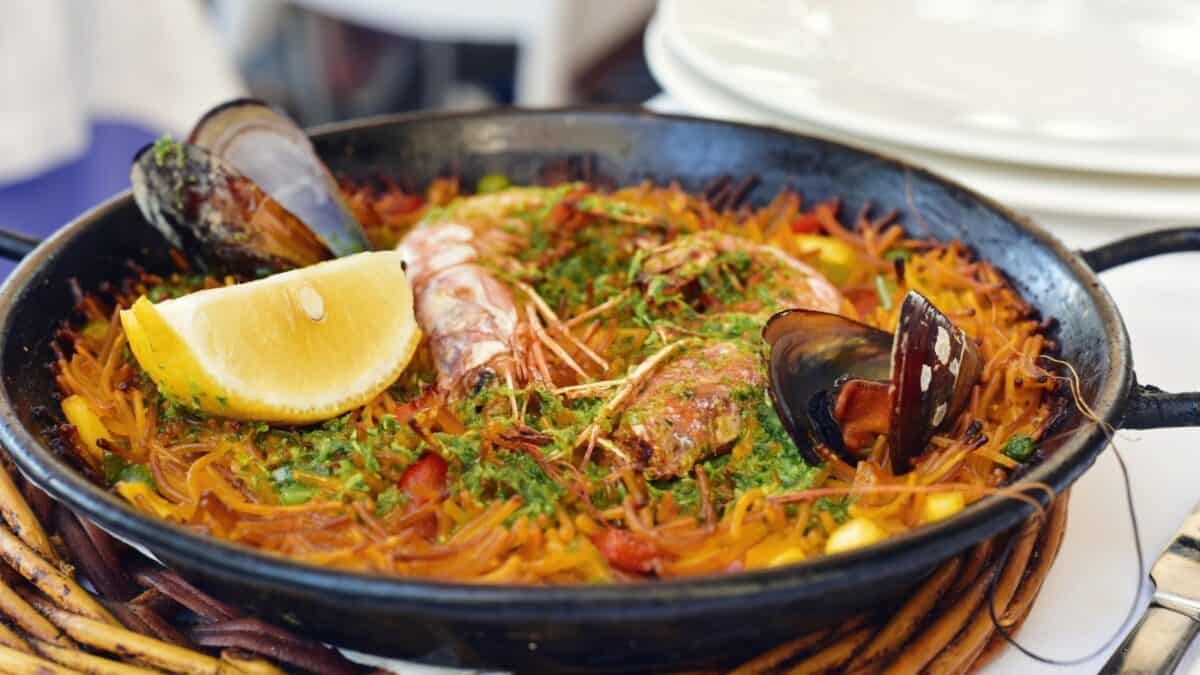<p>Valencia, accumulating 719 5-star reviews, is the birthplace of <strong>paella</strong>, Spain’s most famous dish. </p><p>For an authentic Valencian paella made with chicken, rabbit, and green beans, <strong>La Pepica</strong> offers a memorable and delicious beachside dining experience.</p><p>Valencia offers a culinary experience deeply rooted in the region’s fertile landscapes and maritime heritage. Valencia’s food scene extends beyond paella, offering a variety of dishes that celebrate the freshness and flavors of the Mediterranean.</p>
