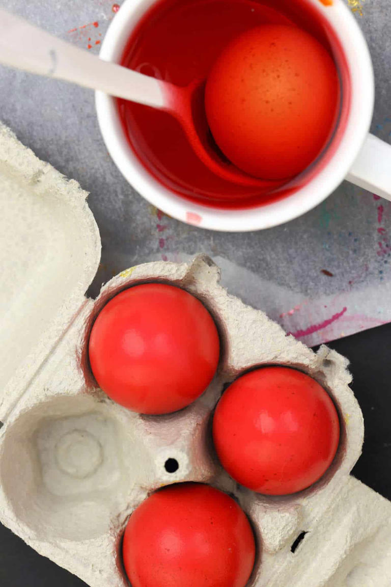 Red Easter eggs and liquid dye.