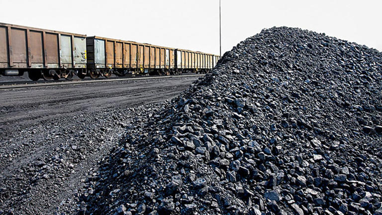 A pile of processed coal next to a rail siding waiting to be put on a train for transportion to a coastal port. PTI