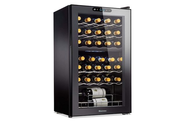 amazon, this sleek, quiet, and stylish wine fridge is the new centerpiece of my dining room