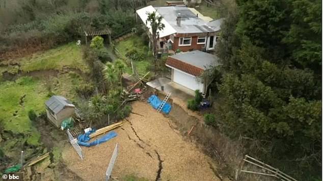 pensioner, 83, who vowed never to leave his crumbling clifftop home is finally forced to move out because it is too dangerous to stay in after landslide