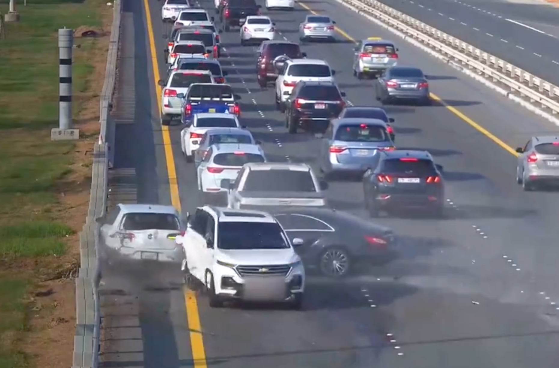 abu dhabi police release crash footage to warn of dangers of distracted driving