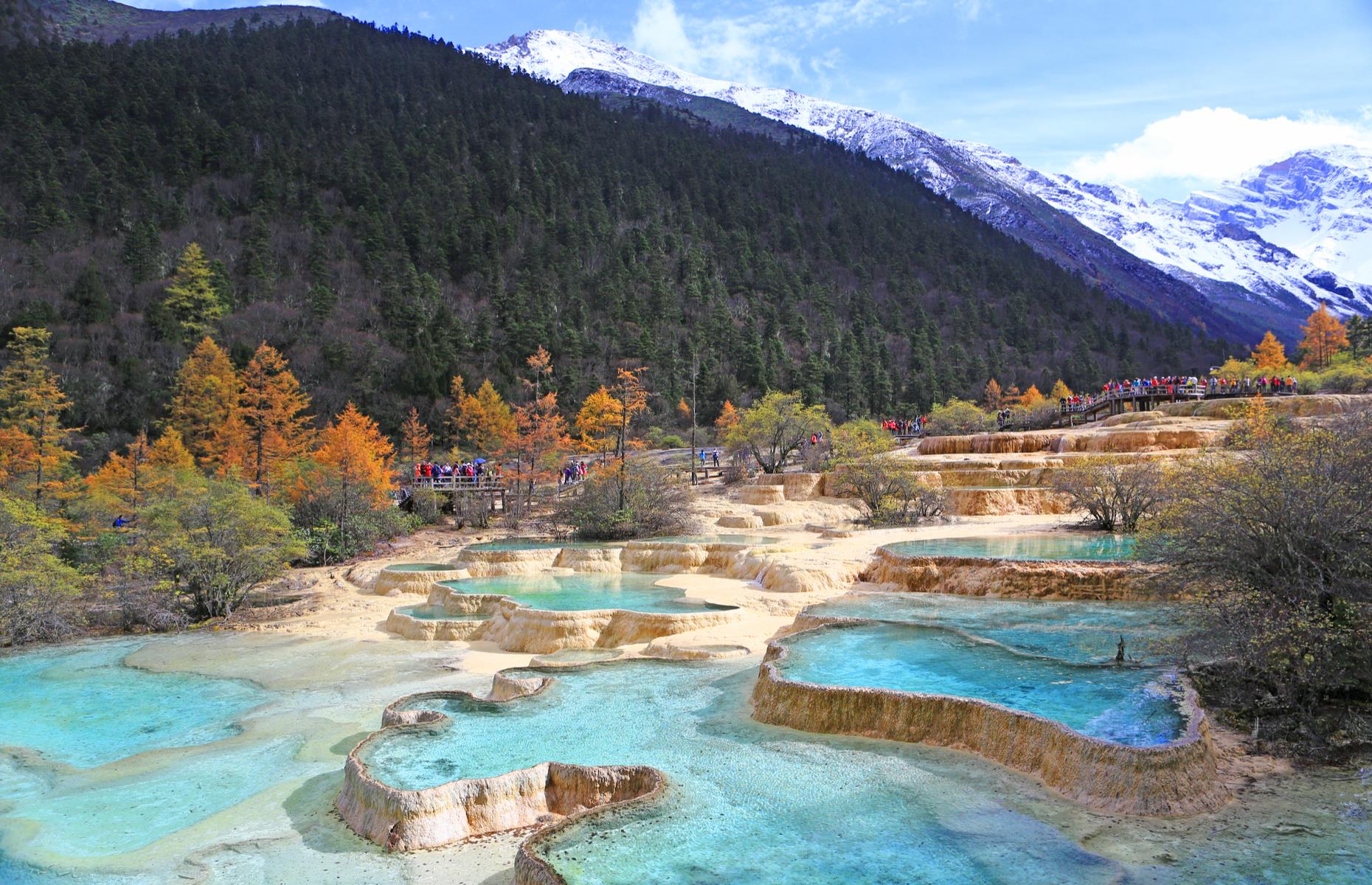 In China’s Huanglong Valley, hot spring water cascades down a series of intensely aquamarine terraced pools, creating a breathtaking spectacle. Formed from calcium carbonate, the ponds and lakes stretch for over two miles through the valley, which is home to giant pandas and the Sichuan golden snub-nosed monkey. You can't bathe here, but you'll see why Huanglong is known as 'Fairyland on Earth.' Visit in October to see it at its most beautiful.