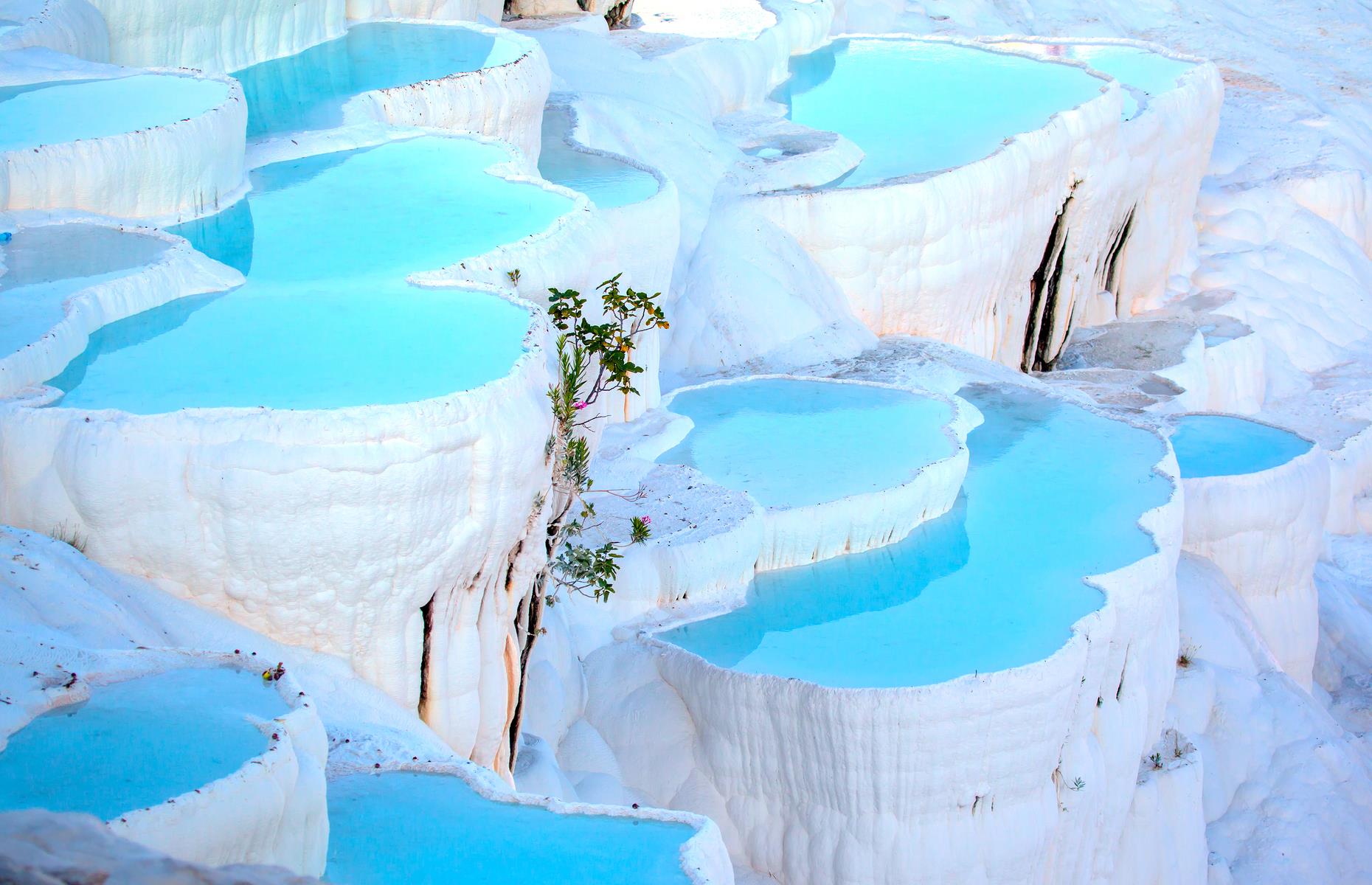 These tiered pools in Turkey are filled with milky white, hot spring water and have formed from limestone deposits over millions of years. The 17 terraces are strictly for looking at, not swimming in, but you can bathe in thermal waters at Cleopatra’s pool, above. To beat the crowds, stay in nearby Pamukkale village and visit in the early morning. The best time to go is spring, when the weather is clear but not too hot.