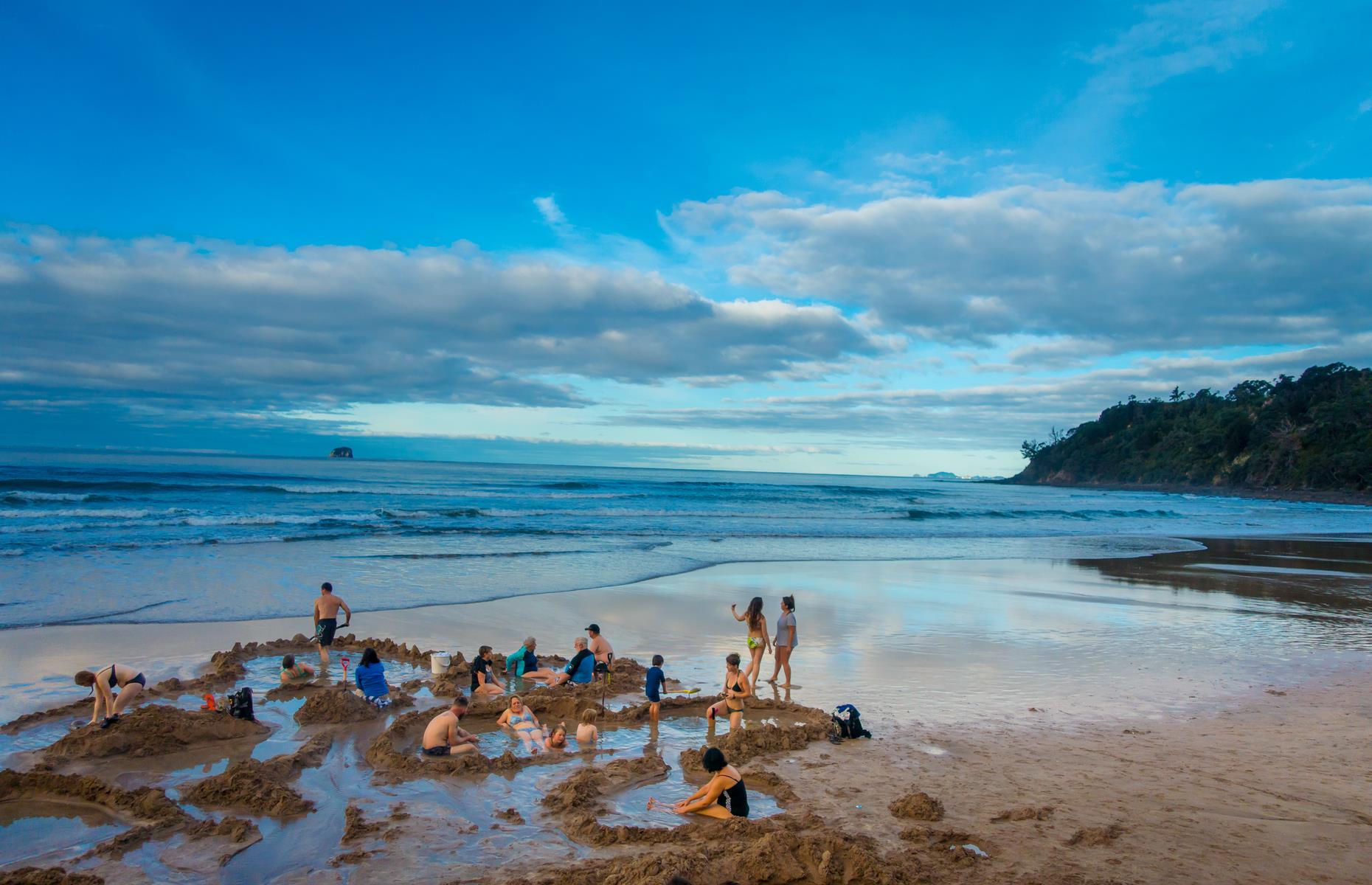 As thermal springs go, Hot Water Beach on North Island’s Coromandel Peninsula offers a unique experience. Here, geothermal waters bubble up through the sand – buy a spade, then hollow out a spot and relax as the warming waters gurgle around you. For the best experience, visit two hours either side of high tide.