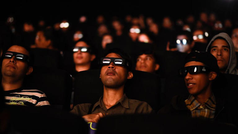 Venezuelan filmgoers watch the first screening in Venezuela of Marvel Studios' "Avengers: Endgame" at a cinema in Caracas on April 26, 2019. - Federico Parra/AFP/Getty Images