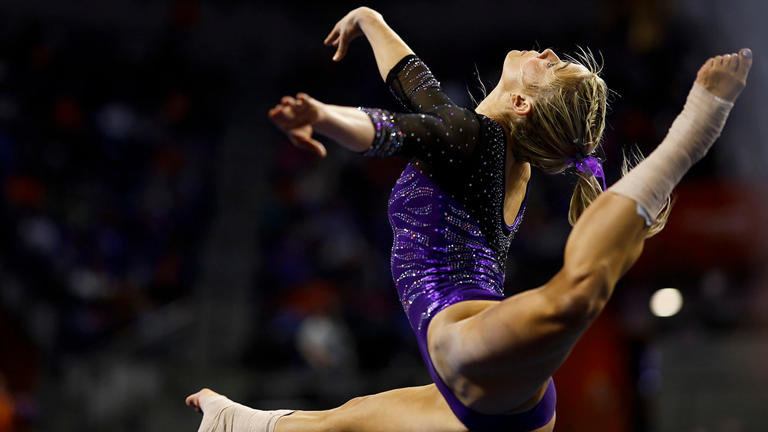 Olivia Dunne of the LSU Tigers competes during a meet against the Florida Gators at the Stephen C. O'Connell Center on February 23, 2024, in Gainesville, Florida. James Gilbert/Getty Images