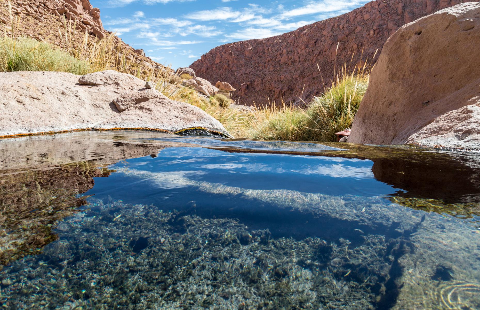 From healing mineral waters to dramatic geysers, Chile’s Atacama Desert is a hotspot for geothermal activity. At Puritama, you’ll find eight crystalline pools, set within a startling green oasis. Connected by a series of wooden walkways, the pools were believed by the Incas to have the ability to cure rheumatism and arthritis.