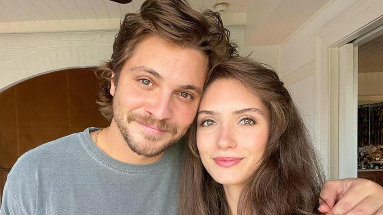 Luke Grimes and Bianca Rodrigues grinning