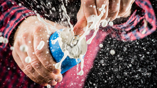 Beer can explodes with foam