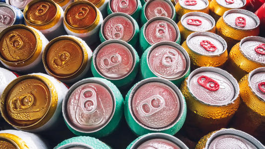 Colorful cans of unopened beer