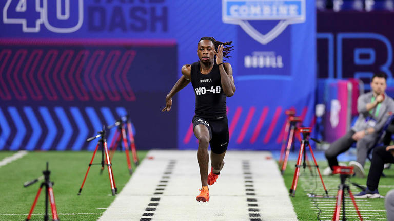 Xavier Worthy ran a 4.25-second 40 before breaking John Ross's 4.22 record in his second attempt, on March 2, 2024, in Indianapolis. Stacy Revere/Getty Images