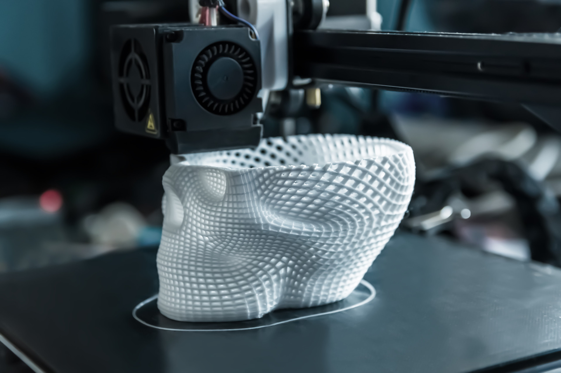 <p>3D printing constructs physical objects layer by layer from digital models. It's a transformative manufacturing process, merging AI, machine learning, and modeling to create intricate designs with diverse applications.</p>