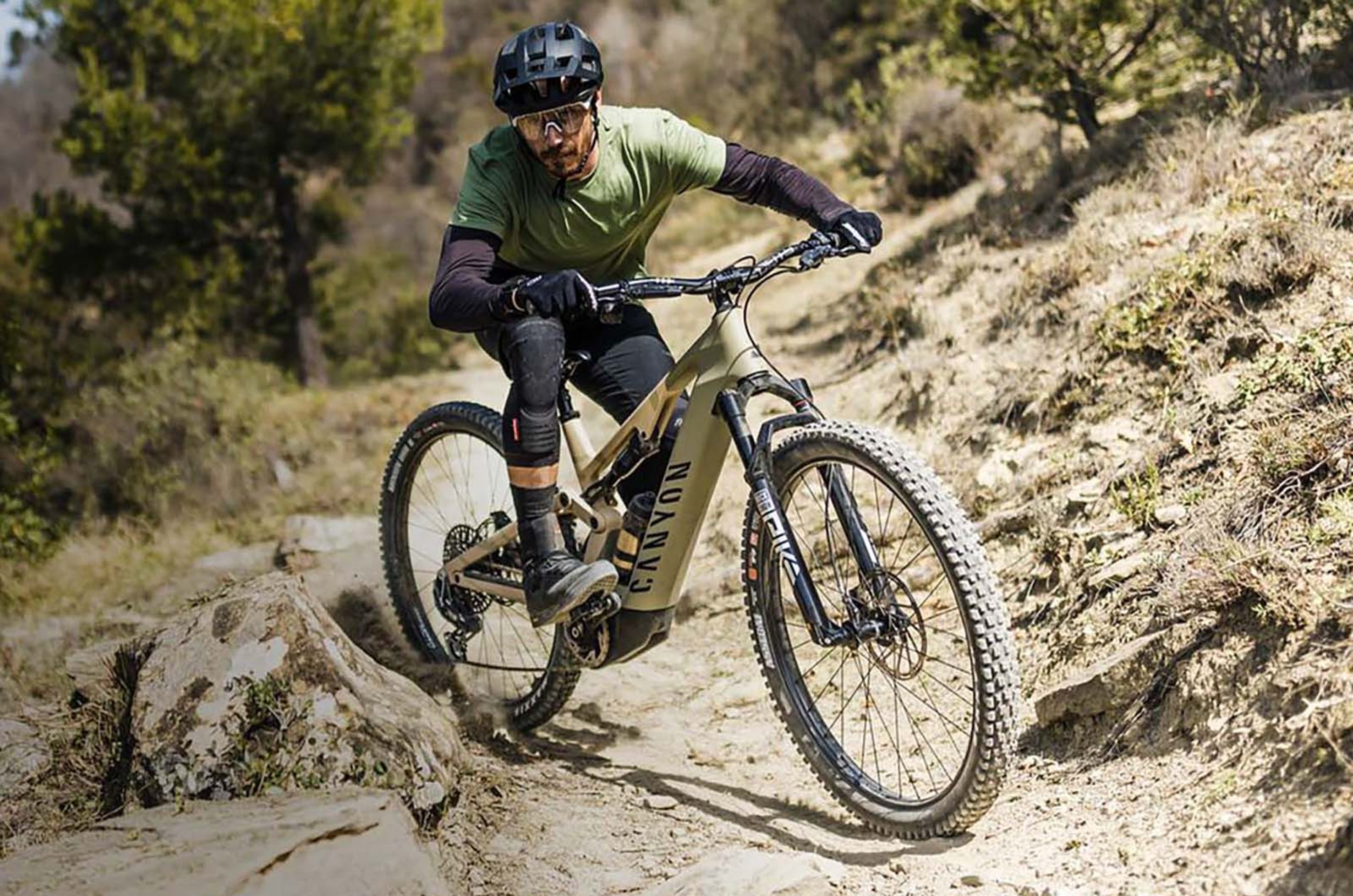 <p>This full-suspension eMTB from Canyon uses the Shimano STEPS EP8 drive system in each model within the range, as well as Canyon’s Triple Phase Suspension design which helps to absorb smaller bumps without compromising on power transfer through the pedals. </p>  <p>The suspension used varies between models, but each bike comes with 130mm travel up front and 130mm on the rear, making it a great e-bike for shredding the local trails or even at the local bike park.</p>