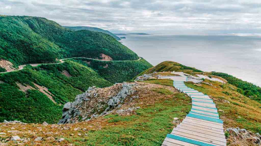 <p>Located in Nova Scotia, Canada, the Cabot Trail is a road trip that promises stunning coastal views and rich cultural experiences. This 185-mile (298-kilometer) route winds through Cape Breton Highlands National Park, where you can marvel at rugged cliffs, lush forests, and vibrant fall foliage. </p><p>Stop at the magnificent fishing village of Chéticamp to indulge in delicious seafood while immersing yourself in Acadian culture. The Skyline Trail, with its stunning views of the Gulf of St. Lawrence, is a highlight not to be missed.</p><p class="has-text-align-center has-medium-font-size">Read also: <a href="https://worldwildschooling.com/most-beautiful-cities-in-the-world/">Amazing Cities in the World</a></p>