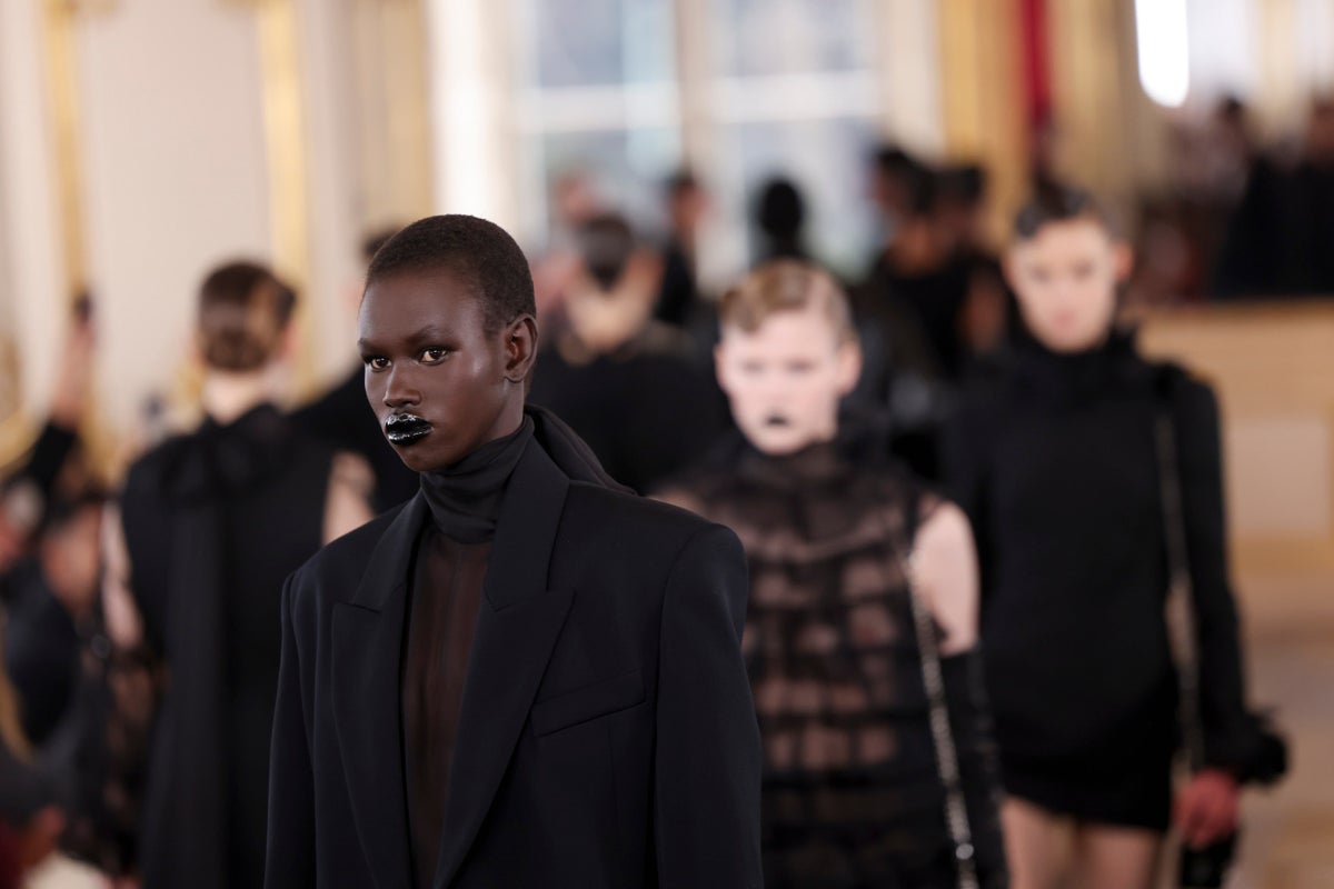 valentino proves all black doesn’t have to be boring at paris fashion week