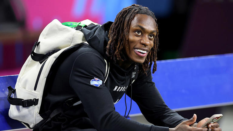 Xavier Worthy smiles after breaking the 40-yard dash record with a time of 4.21 seconds during the NFL Combine on March 2, 2024. Stacy Revere/Getty Images