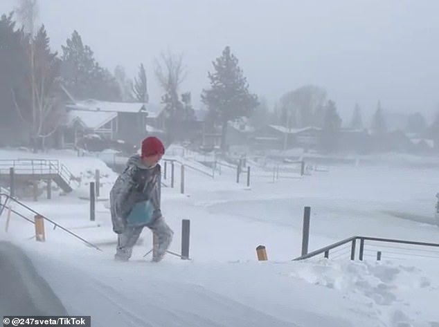 california battles fifth day of snowstorms and 190mph winds as life-threatening blizzard knocks power out for 23,000 residents and freeways shut down - with more winter weather on its way