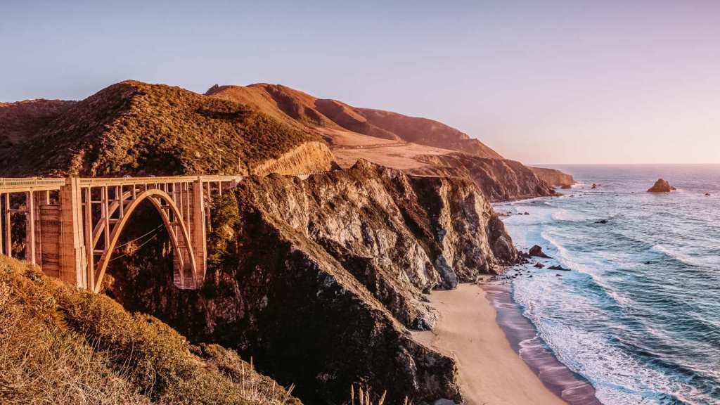 <p>Pacific Coast Highway stretches along the California coast from San Francisco to San Diego. Aside from unparalleled views of the Pacific Ocean, this route takes adventurers past famous landmarks such as Big Sur, the Golden Gate Bridge in San Francisco, and the picturesque McWay Falls.</p><p>This same route features historic and architecturally significant bridges, including the Bixby Creek Bridge and the McWay Creek Bridge. You also stand a chance to spot seals, sea lions, dolphins, and even whales during your road trip.</p><p class="has-text-align-center has-medium-font-size">Read also: <a href="https://worldwildschooling.com/us-west-coast-road-trip/">US West Coast Road Trip</a></p>