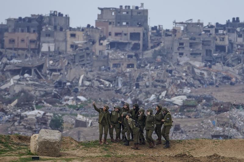 how this ap photographer caught this image of israeli soldiers taking a selfie at the gaza border