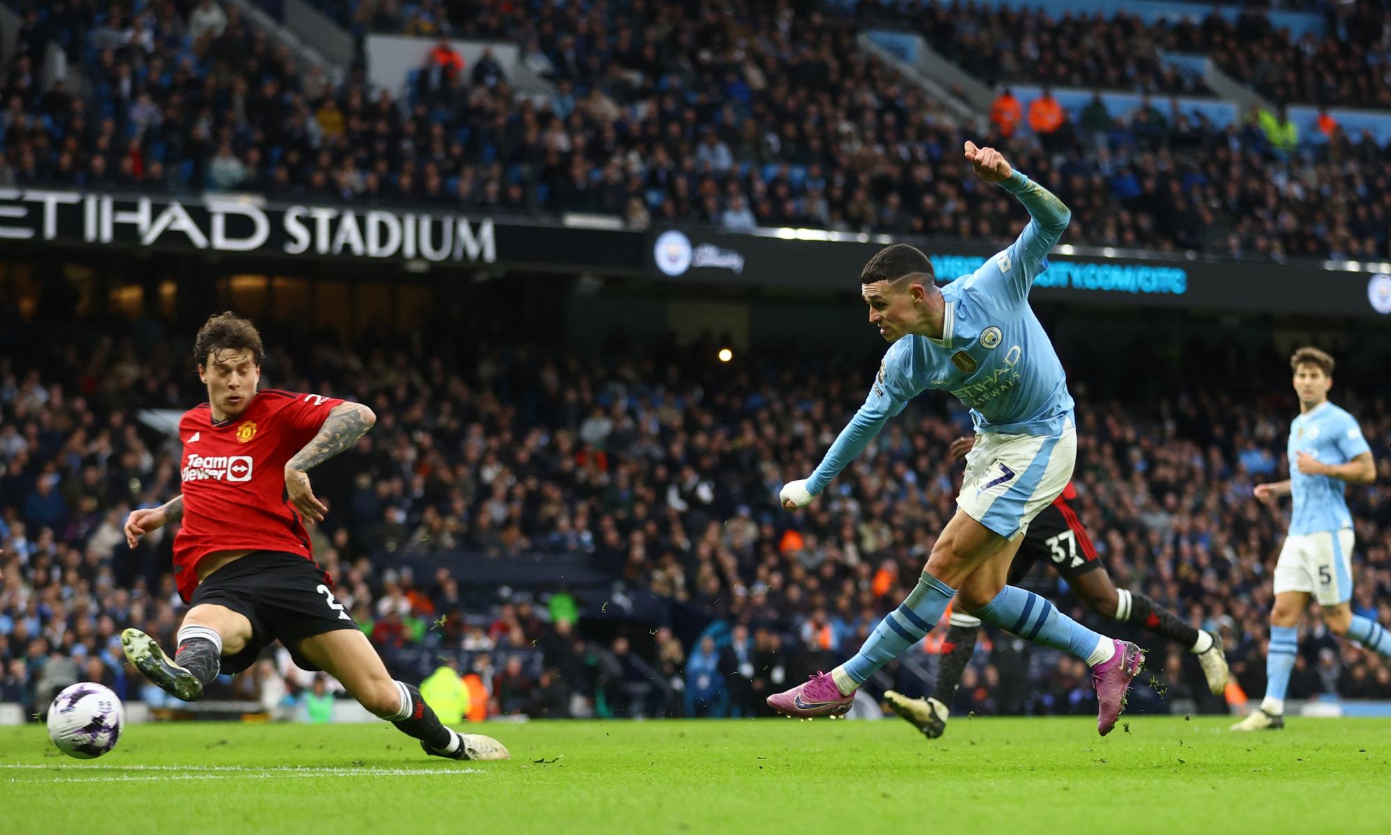 foden earns city spoils in manchester derby to keep pressure on liverpool