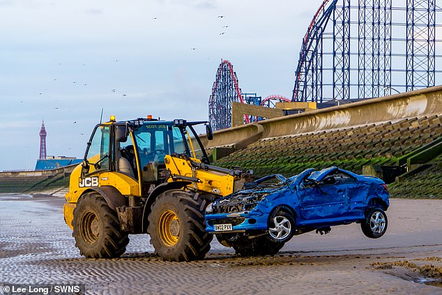 you can't park there! drivers ruthlessly mocked after two cars left on beach are completely destroyed by the sea