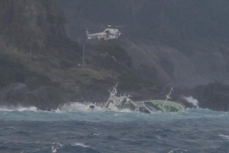 24 fishermen rescued from half-submerged ship in rough seas off japanese island, but 1 found dead