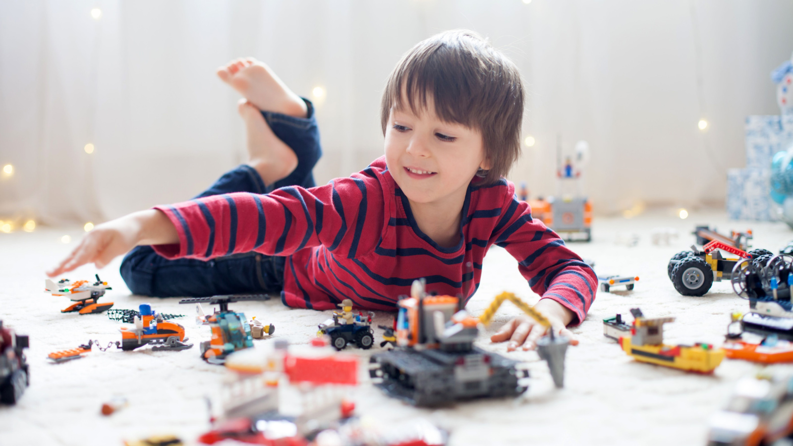 image credit: Tomsickova Tatyana/Shutterstock <p><span>Utilize building blocks or LEGO to let children create their own cities, spaceships, or fantasy lands. This hands-on activity enhances spatial awareness and problem-solving skills. As they build, encourage them to narrate stories about their creations. It’s a blend of engineering and storytelling, sparking both logical and creative thinking.</span></p>