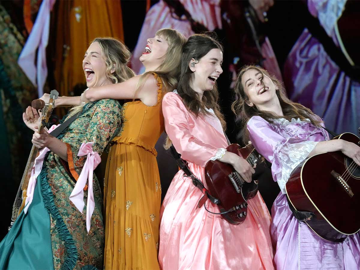 <p>In 2023, Taylor Swift treated fans to an electrifying concert experience, enhanced by a surprise appearance from the talented HAIM sisters. Este, Danielle, and Alana Haim joined Swift on stage, igniting the crowd with their infectious energy and harmonious vocals on their collab song from <em>evermore</em> titled "no body, no crime." </p> <p>The HAIM sisters' cameo added an extra layer of excitement to an already unforgettable night for fans. The unexpected collaboration showcased the strong bond between the artists and delighted audiences with a memorable performance. </p>