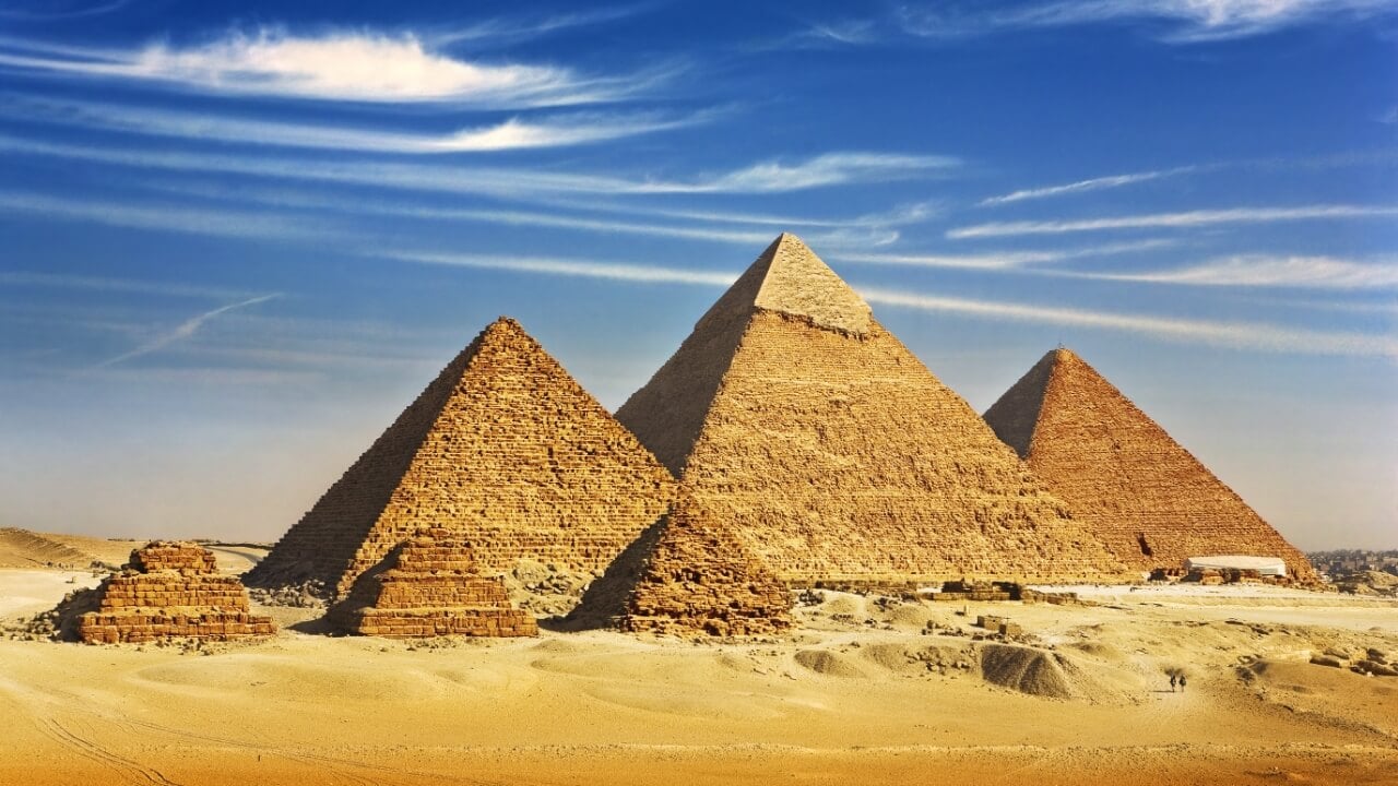 <p>Built during the era of the Old Kingdom, these three famous pyramids are more than 4000 years old. <a href="https://www.pyramid-of-giza.com/about-pyramids-of-giza/">The Great Pyramid of Giza</a> is one of the seven wonders of the world and one of the most visited places in the world. The question of how the pyramids were built remains a mystery to this day, despite the archeologist’s best efforts to figure it out!</p>