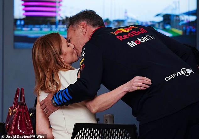 moment f1 boss christian horner places hand on waist of wife geri halliwell after bahrain reunion as storm continues over 'leaked texts'