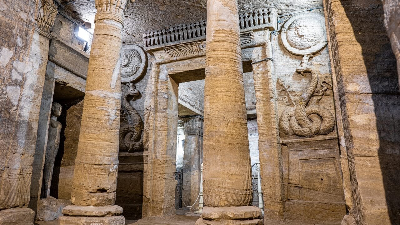 <p>If you want to see a mix of Roman, Greek, and Egyptian heritage, you should head to the Catacombs of Kom el Shoqafa. Pay attention to the Rotunda, a hall decorated with unique geometric shapes, mostly covered in an iconic shade of red. </p>