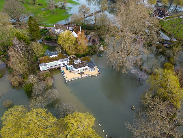 debbie mcgee is forced to move out of £3million berkshire mansion as it floods again after banks of the thames burst around luxury home she shared with her late tv magician husband paul daniels