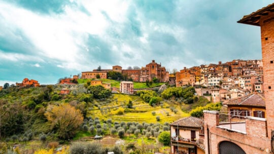 <p><span>Siena, a UNESCO World Heritage gem in Tuscany, is highlighted by its red-brick buildings and the famous Piazza del Campo. Its essence is a rich tapestry of history, culture, and breathtaking landscapes. Key sights include:</span></p><ul> <li><span>The art-rich Siena Cathedral.</span></li> <li><span>The commanding view from Torre del Mangia.</span></li> <li><span>The adrenaline-filled Palio horse race.</span></li> </ul><p><span>Wander its quaint streets, taste the local Tuscan delights, and sip on fine wines. Siena embodies the spirit of Italy with its architectural wonders and culinary traditions, making it an unforgettable destination.</span></p>