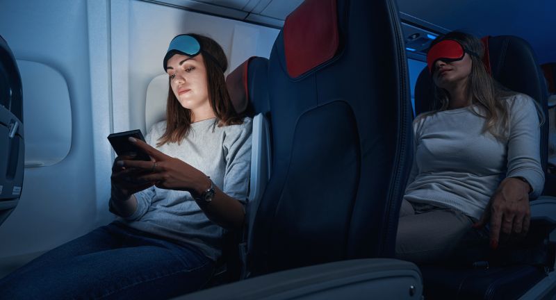 <p>The glare from screens in a dimmed cabin can be a significant annoyance to others trying to sleep. Dimming your screen or using a blue light filter can help mitigate this issue. Consideration for others’ need to rest enhances the shared travel experience.</p>