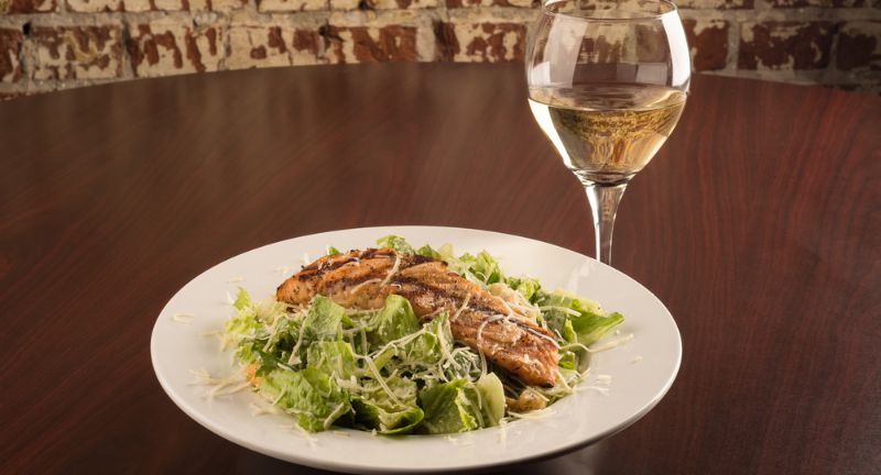 <p>The crisp, herbal qualities of Vermentino cut through the creamy dressing of a Caesar Salad, offering a refreshing and balanced pairing. The wine’s acidity and mineral notes complement the salad’s flavors, enhancing the taste of the romaine and the anchovies. This pairing is light yet satisfying, making it an excellent choice for a starter or a light meal. The combination of Vermentino and Caesar Salad brings a touch of Mediterranean flair to the table, promising a delicious and harmonious dining experience.</p>