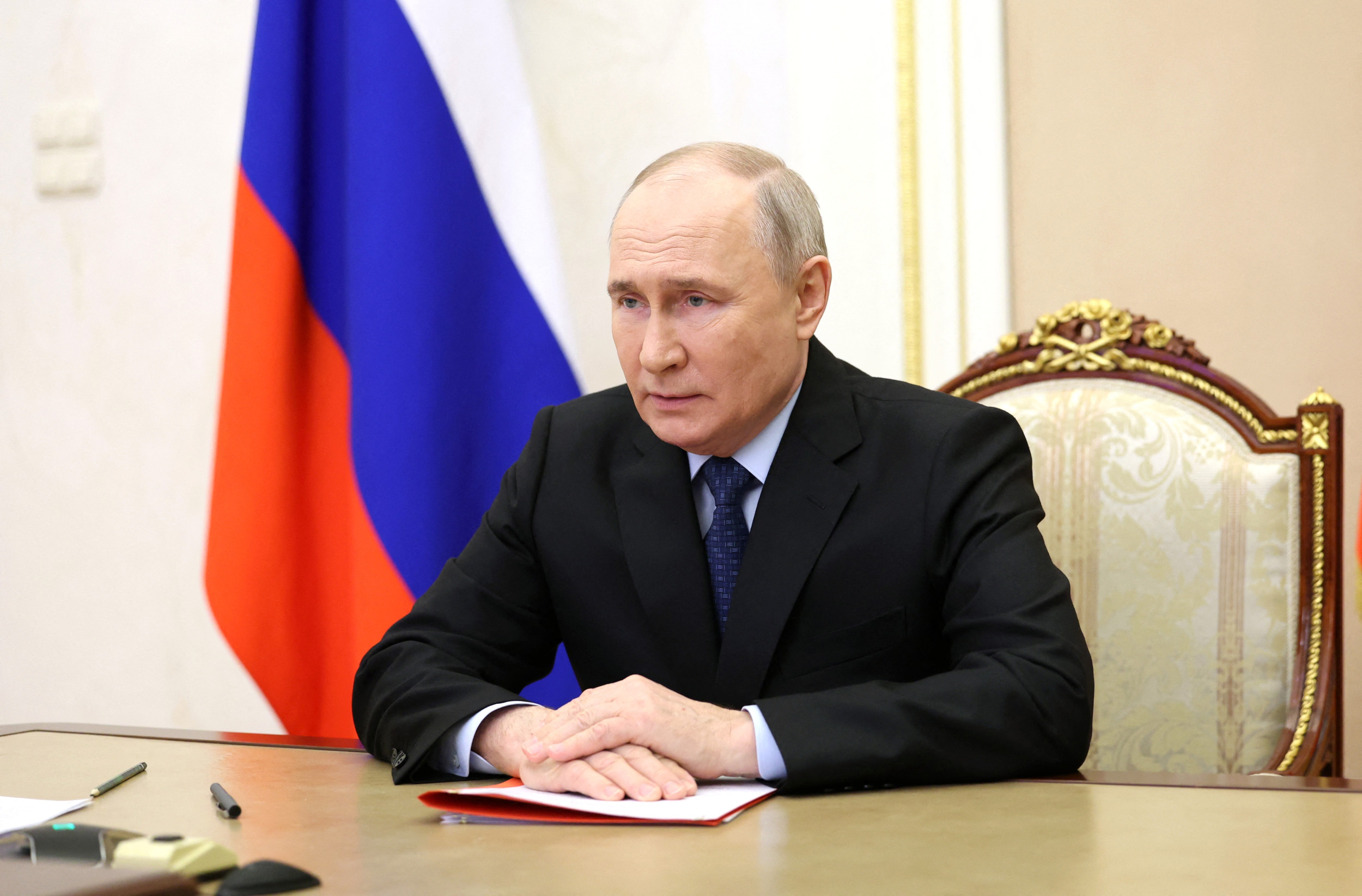 vladimir putin is writing checks his government just can't cash