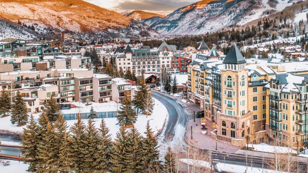 <p>Located on the slopes of Vail Mountain, this town is a renowned winter sports getaway. While the town has several world-class resorts, you want a slice of the massive Vail Ski Resort.</p><p> Admire the charming alpine scenery on the slopes of the Vail Mountain. Then, take cable cars to get better views of the snowy villages for better views. </p><p>If you’re feeling adventurous, consider dog sledding, where huskies lead tourists through the snowy scenery. You may also want to enjoy horse sleigh rides and fat biking on the snowy trails. </p><p>Wrap up by exploring the Colorado Snowsports Museum, which showcases exhibits of World War II’s mountain troops and the 10th Mountain Division. It also pays tribute to notable figures in the snowboarding and ski industry.</p><p class="has-text-align-center has-medium-font-size">Read also: <a href="https://worldwildschooling.com/mountain-getaways-in-the-us/">Amazing US Mountain Getaways</a></p>