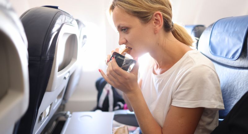 <p>Eating strong smelling foods in a confined space like an airplane is unpleasant for everyone on board. Opting for less aromatic food items respects the shared air space. Consider eating before boarding or selecting neutral smelling snacks for the flight.</p>