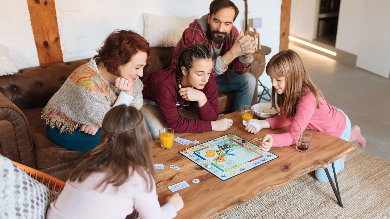 <p>Some of us only play board games like Monopoly or Trivial Pursuit when forced to during vacation or at family get-togethers. Must we have digital entertainment as our (pun-heavy) default setting? Families with young kids benefit from the shared experience, humor, and collective problem-solving opportunities.</p>