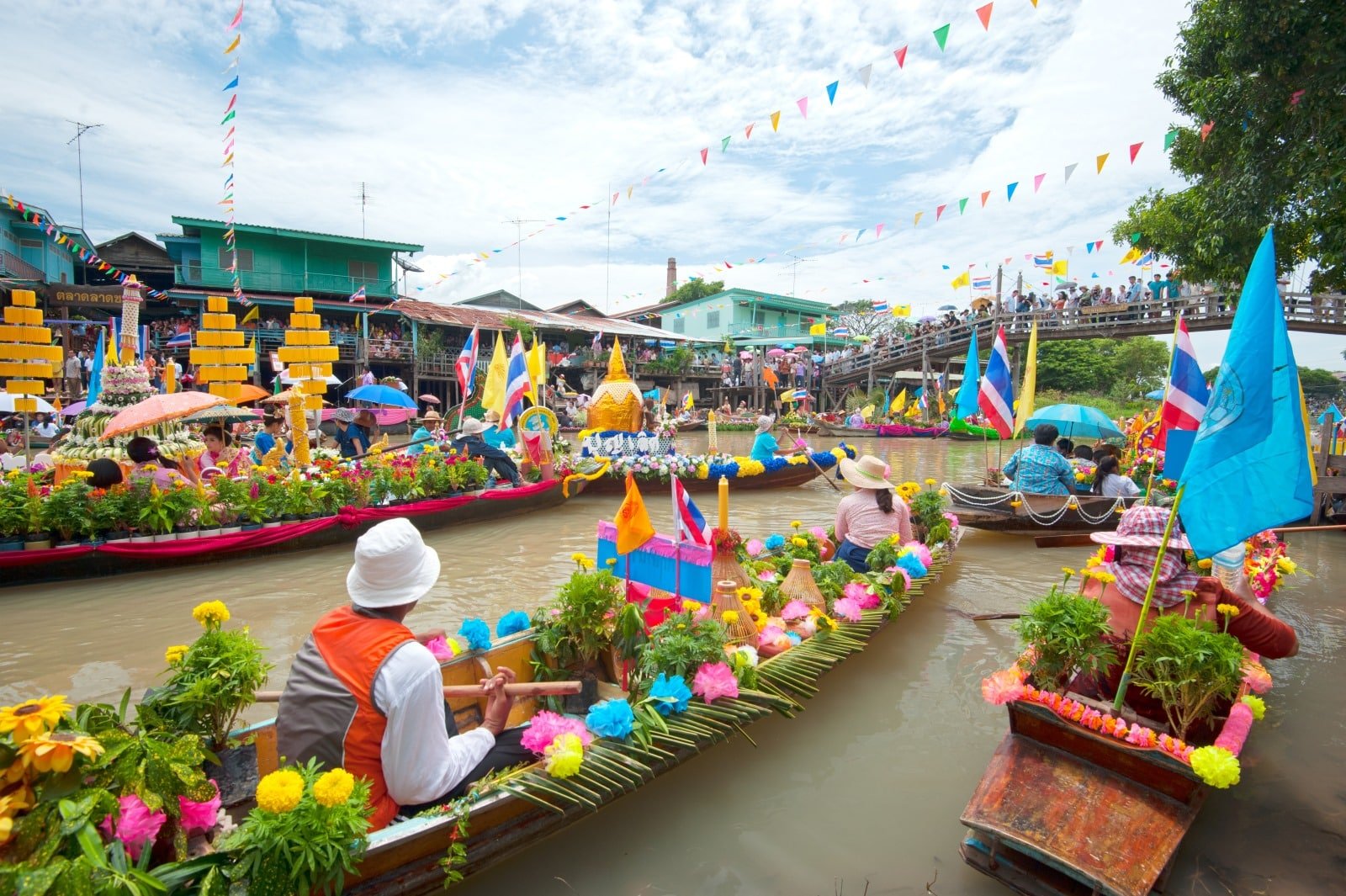<p><span>The floating markets near Bangkok, such as Damnoen Saduak and Amphawa, offer a vibrant and colorful glimpse into traditional Thai life. These bustling waterways, lined with boats laden with fresh produce, local delicacies, and handicrafts, present a lively and picturesque scene.</span></p> <p><span>A visit to these markets is a sensory experience, with the sights, sounds, and smells of authentic Thai commerce and cuisine. Damnoen Saduak, the most famous of these markets, provides a more tourist-focused experience, while Amphawa offers a more local atmosphere and is primarily known for its evening seafood vendors.</span></p> <p><span>Exploring these floating markets by boat or along the canalside walkways is a unique way to experience the local culture and indulge in some of Thailand’s most delicious foods and charming souvenirs.</span></p> <p><b>Insider’s Tip: </b><span>Take a boat tour to fully experience the market and try local snacks from the floating vendors.</span></p> <p><b>How To Get There: </b><span>The floating markets are accessible by bus or organized tours from Bangkok.</span></p> <p><b>Best Time To Travel: </b><span>Visit early in the morning to avoid the crowds and the heat.</span></p>