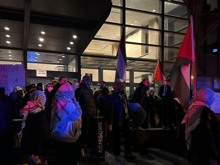 A protest outside the Federation CJA in Montreal, home to the Jewish Community Foundation of Montreal and the Montreal Holocaust Museum.