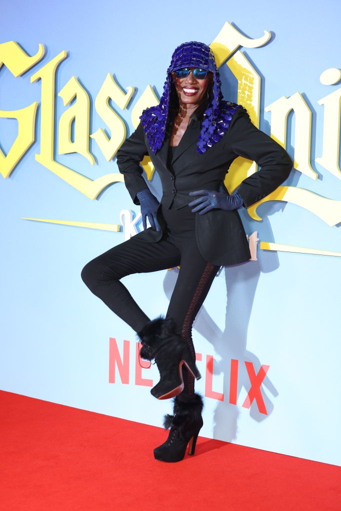 <p>Although she didn't appear in the second Benoit Blanc mystery, Grace Jones makes a mark on the red carpet with her glittery hat draped over her sharp blazer. We want Jones in the cast for the next <em>Knives Out</em> mystery.</p>