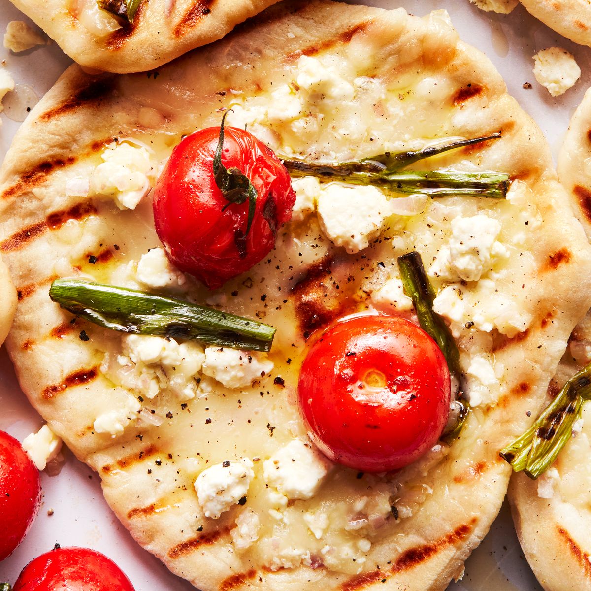 These Grilled Tomato Feta Pizzettes Are Ideal For Customizing