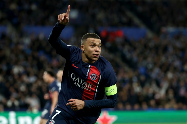 mbappe double fires psg past real sociedad to champions league quarters