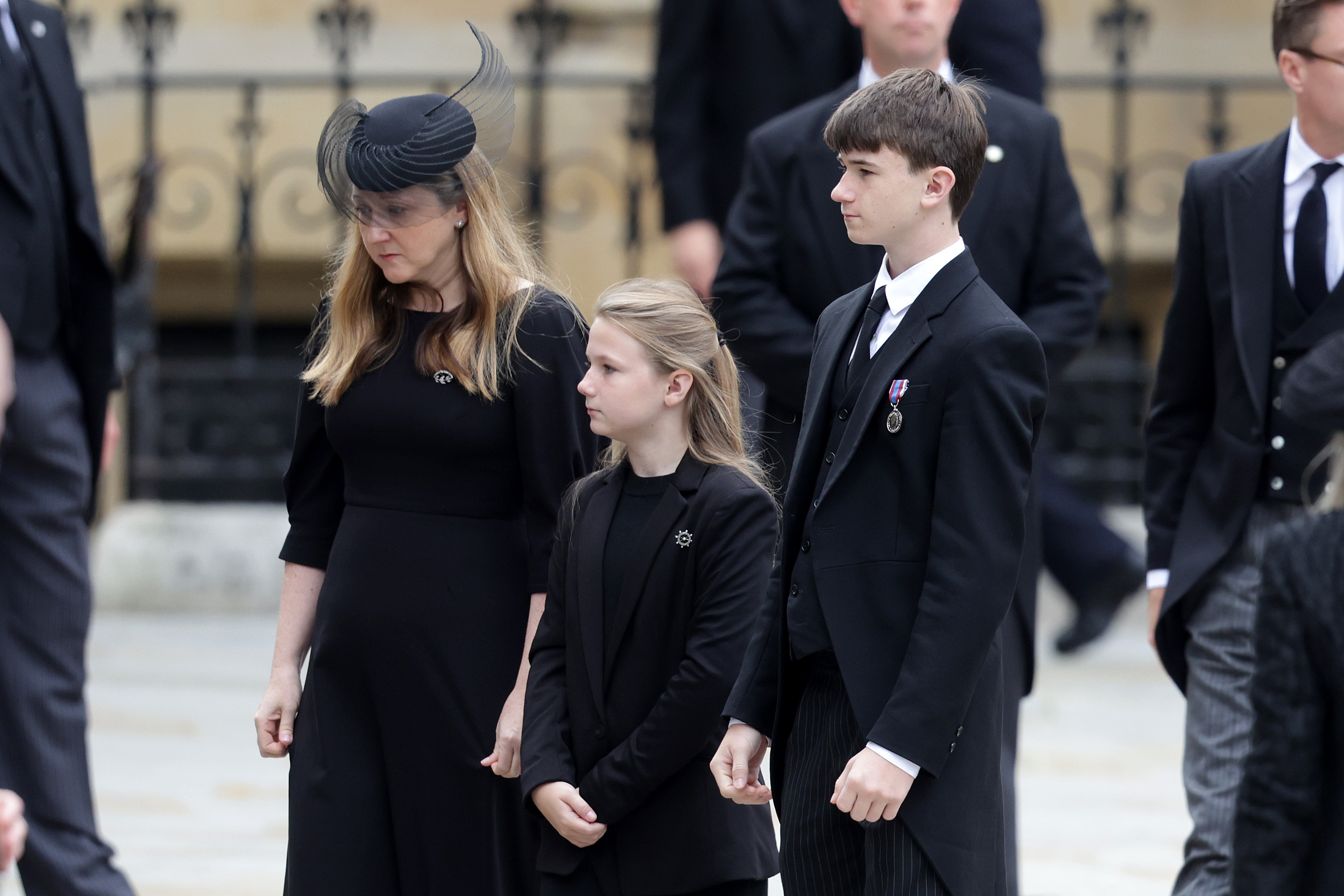 <p>The children of Alexander Windsor, Earl of Ulster are next up. </p><p>The earl's son — Xan Windsor, Lord Culloden — is 33rd in the line of succession. His daughter, Lady Cosima Windsor, is 34th in the line of succession. </p><p>The young royals, who are the grandchildren of Prince Richard, Duke of Gloucester — a first cousin of the late Queen Elizabeth II — are seen here with their mother, Claire, the Countess of Ulster.</p>