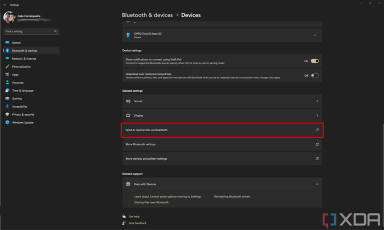 Screenshot of the Settings app in Windows 11 showing the option to send or receive files via Bluetooth